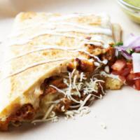 Quesadilla · Crispy flour tortilla, fancy Monterey jack cheese and your choice of meat.