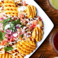 Papa Loca · Fries, meat, queso, sour cream, pico de gallo and cheese. Please select items you would like...