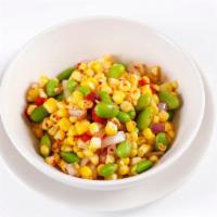 Sweet Corn Succotash · Yellow corn, red onion, sweet peppers, and edamame.