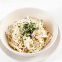 Cole Slaw · Shaved savoy cabbage and creamy poppy seed dressing.