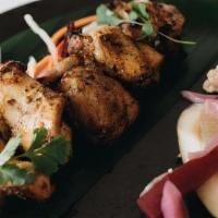 Black Pepper Chicken Tikka Kabob · chicken thigh marinated with tandoori spices,   tellicherry pepper