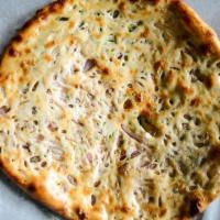 Onion Naan · leavened bread stuffed with onions   and spices