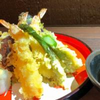 Tempura · 3 pieces of shrimp and assorted vegetables deep fried in tempura batter.