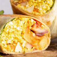 Vegan Breakfast Wrap or Pita · Wraps or Pita filled with Tofu scramble, Vegan cheese and Vegetables. Vegetables include oni...