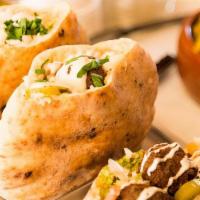 VEGAN PITA SANDWICHES or WRAPs · Four Falafels or Mushroom Shawarma or Vegan meat stuffed in Pita with hummus, Tahini, Israel...