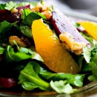 Blossom Hill Salad · Arugula, Beets and Oranges served with salad dressing of your choice