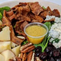 Spinach Pecan Salad · Spinach, Red apple, Pecans, Blue Cheese, Bacon and choice of your salad dressing.