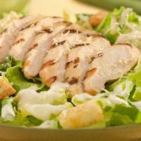 Chicken Caesar · Grilled chicken breast on top of crisp romaine, tossed with creamy caesar dressing, croutons...