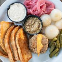 Kiev Style Chicken Liver Appetizer · Kiev style chopped chicken liver pate, toasted rye bread, pickled onions, pickled carrots, a...