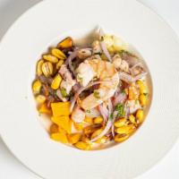 Seafood Ceviche · The seafood version of our iconic Peruvian ceviche. Comes with shrimps, sacallops, and calam...