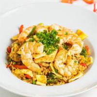 Shrimp Fried Rice · Peruvian-style fried rice sauteed with broccoli, bell pepper, aspargus and eggs, mixed with ...