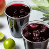 Chicha Morada · Traditional, sweet Peruvian beverage made with purple corn juice and a splash of lime served...