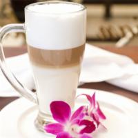 Cafe Latte · Single or double shot of espresso with steamed milk, finished with a layer of foam.