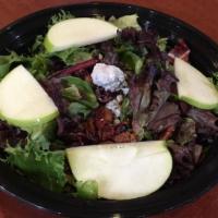 Harvest Salad · Mixed spring greens, apple slices, dried cranberries, blue cheese, and candied walnuts with ...