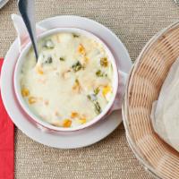 Queso Fundido · Melted Oaxaca cheese with rajas, corn.
