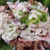 Lettuce Wrap · Pulled chicken adobo with rice, coleslaw & cilantro on leaf lettuce.