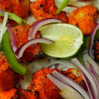 Fish Tikka Kabab · Fish cubes marinated in spices and roasted.