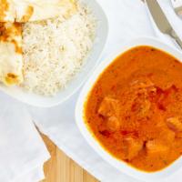 Butter Chicken · Shredded roasted chicken in tomato, butter and fenugreek sauce.