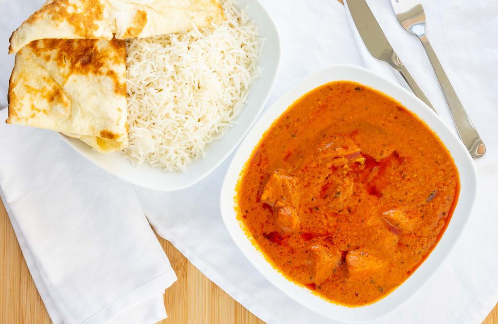Butter Chicken · Shredded roasted chicken in tomato, butter and fenugreek sauce.
