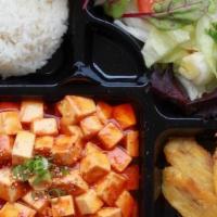 Tofu Rice Plate · Served with rice green salad and plantain.