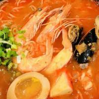 Seafood Ramen · Spicy soup base, shrimps, clams, squids, boiled egg, and green onion.