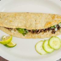 Quesadilla De Carne · With cheese, cilantro, onion, and salsa on the side.