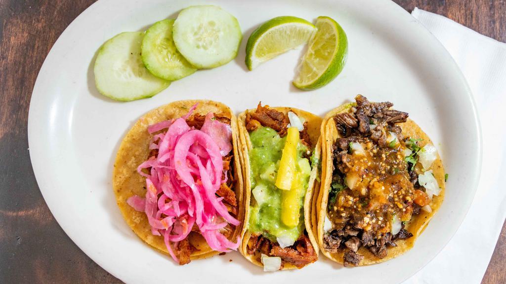 Taco's · Served on corn tortilla with cilantro, onion, and salsa.
