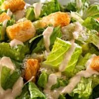 Classic Caesar Salad · Vegetarian. Creamy Caesar Dressing, Shaved Parmesan & Toasted Croutons.