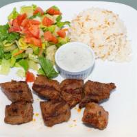 30. Lamb Shish Kebab · Char grill skewer of marinated lamb cubes.