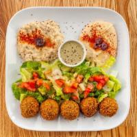 33. Falafel Plate · Falafel with hummus, Baba ganoush and house salad (no rice).