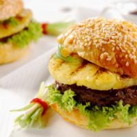 The Hawaiian Burger · Juicy 1/3 pound grilled beef burger with sweet grilled pineapple rings and teriyaki glaze on...