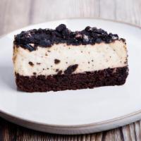 Oreo Cake · Moist chocolate cake marbled with crumbles Oreo pieces and a thick layer of cookies and crea...