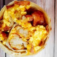 Classic Breakfast Burrito · Your choice of meat with tots, scrambled eggs, and cheese.