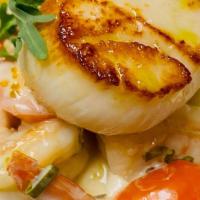 Seafood Pasta (House-made) · Scallops, shrimp, mussels, tomatoes, parmesan, basil, garlic, cream.