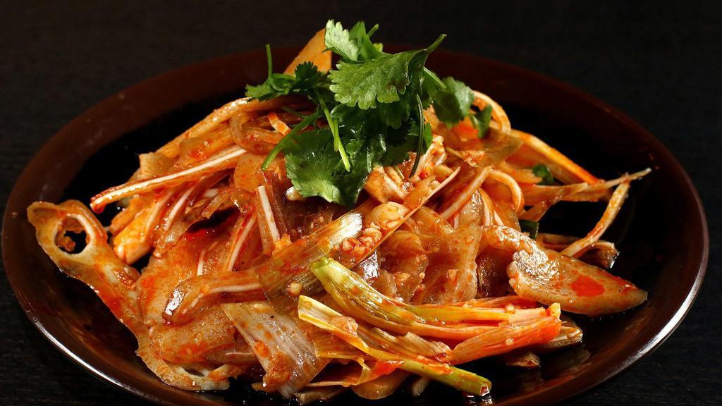 A8. Pig Ear in Red Oil · Medium spicy.