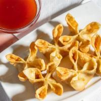 Crab Meat Rangoons · Cooked.