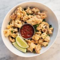 Calamari · Lightly fried, served with a lemon wedge and cocktail sauce.