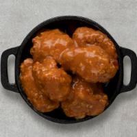 Mango Habanero Boneless Wings · Served with celery or carrots, and blue cheese or ranch.