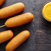 Corn Dogs  · Battered and seasoned deep fried sausage.