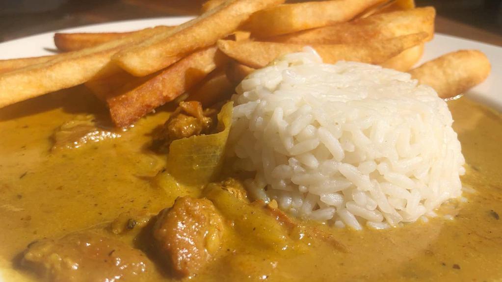 Chicken Curry n Chips · Lightly spiced white wine curry with chicken and mango chutney. Served with fries. rice, vegetables, or choice of two.