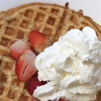 36.  Fresh Strawberry or Blueberry Waffle · Served with whip cream.