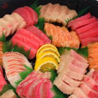78. Sashimi Combo (20pcs) · A mix of Tuna, white-Tuna, salmon, hamachi, and tai.