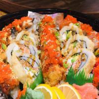 Party Tray 1 · 1 Dragon Roll (Tempura Shrimp w/ Unagi &
Avocado, Masago on top). 1 Rainbow Roll (Tempura Sh...