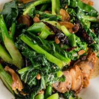 Crispy Pork Belly · Crispy baked pork belly stir with Chinese broccoli in our house sauce.