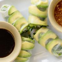 11. Avocado Rolls · Two fresh wrapped spring rolls with avocado, lettuce mints, cilantro, cucumbers and carrots....