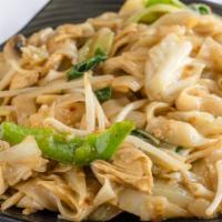 39. Pad Kea Mow · AKA drunken noodle. Thick rice noodle pan fried in basil, bamboo, cabbage onions, mushrooms,...