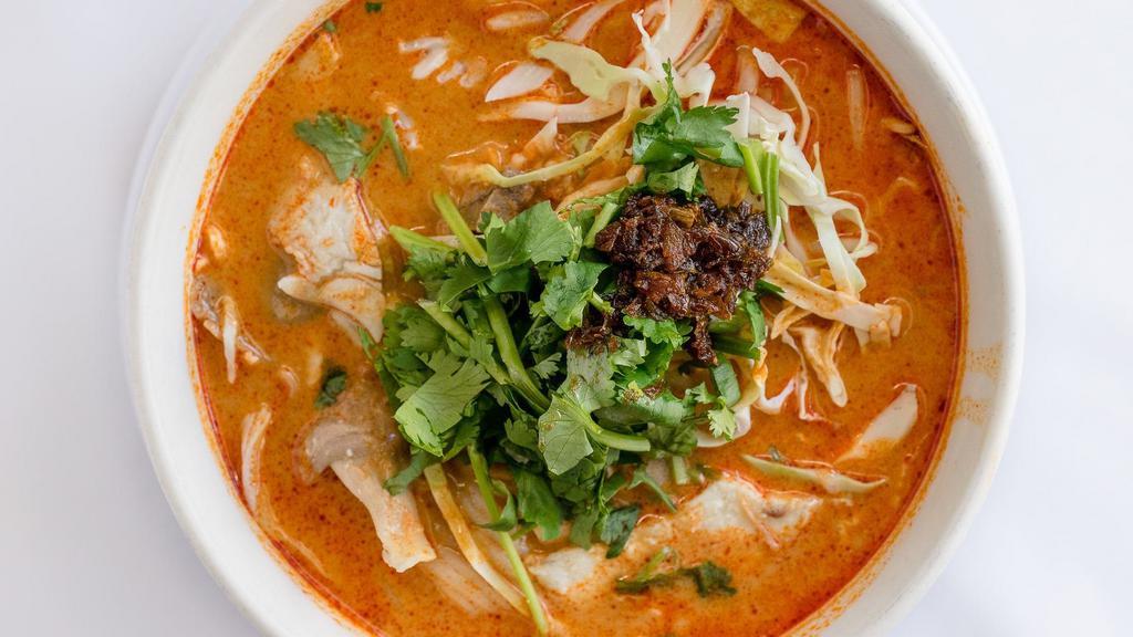 29. Lao's Vermicelli - Kaow Poont · Coconut soup in a spicy chicken curry base with vermicelli noodles, bean sprouts, cabbage, and chicken.
