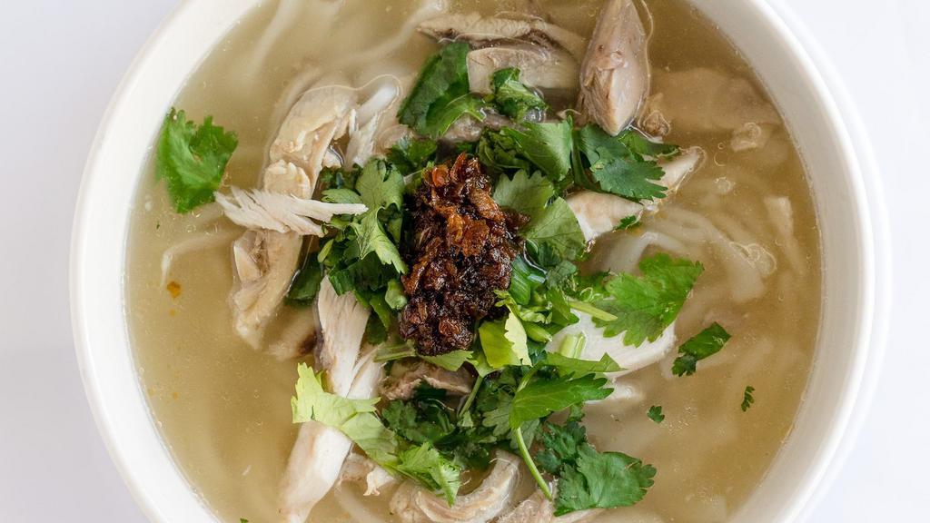 27. Lao’s Noodle Soup - Kaow Paik · Hand pulled rice noodle soup in chicken broth, green onions, cilantro, and crispy garlic with a choice of protein.