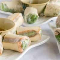 2. Fresh Spring Rolls · Vermicelli, mints, and lettuce with a choice of chicken, pork, shrimp, or tofu in a rice wra...