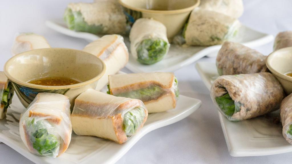 2. Fresh Spring Rolls · Vermicelli, mints, and lettuce with a choice of chicken, pork, shrimp, or tofu in a rice wrapper.